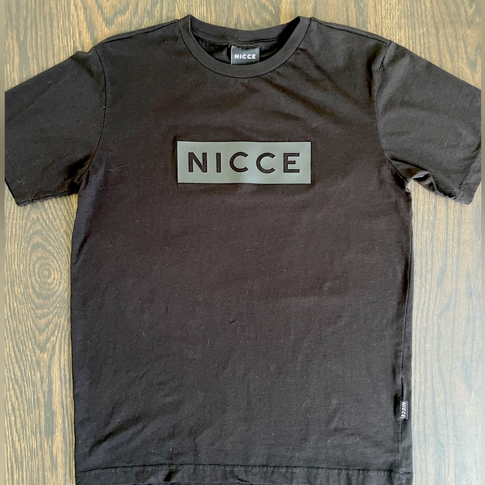 Mens Black T-shirt. Crew neck. NICCE logo printed on front. Size S